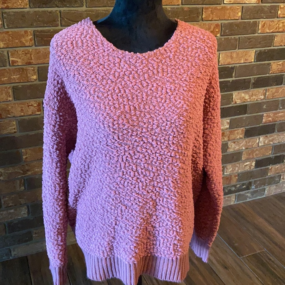 Size medium pink popcorn sweater with back open